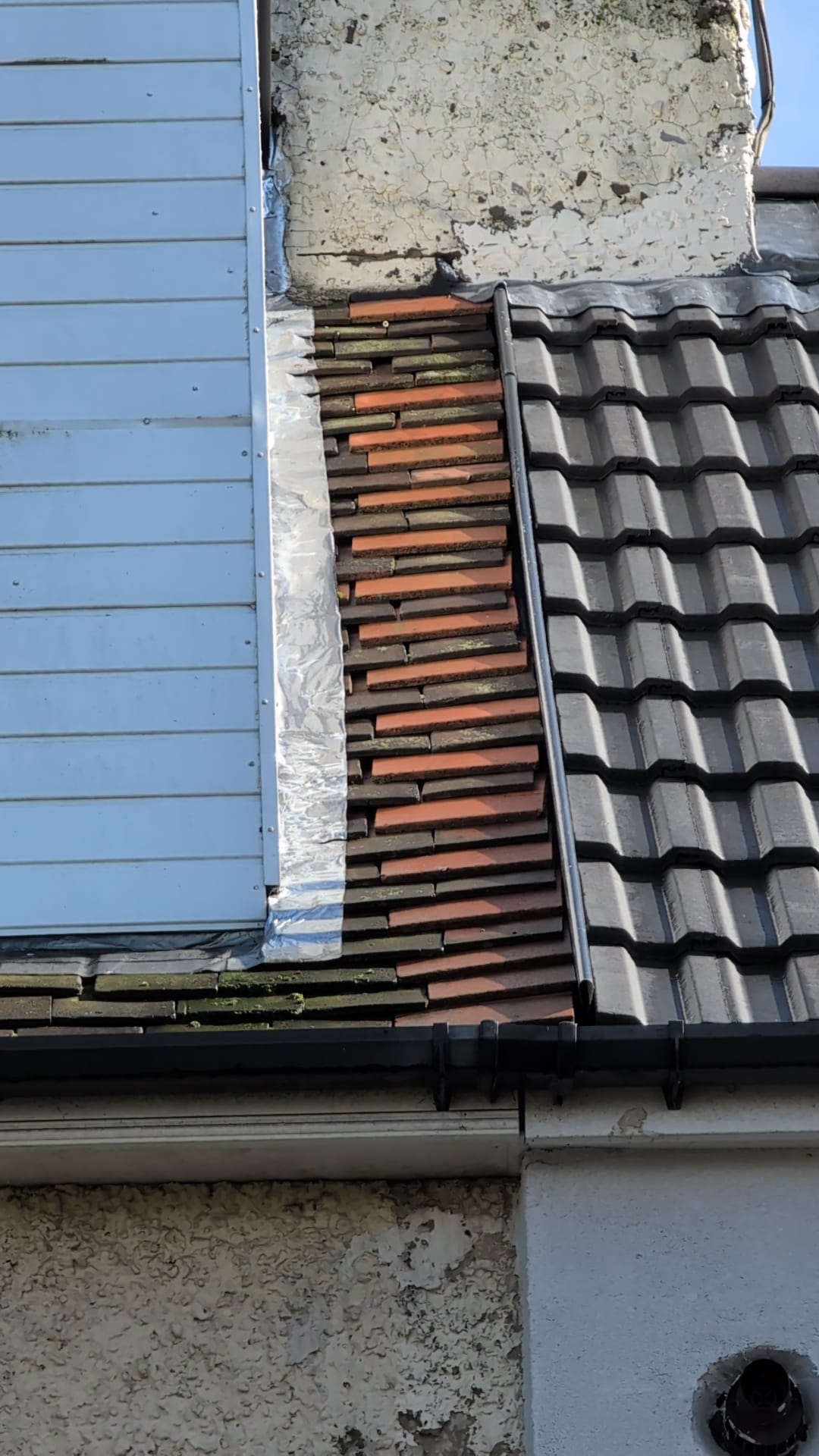 Roof repair work in progress on Bristol property