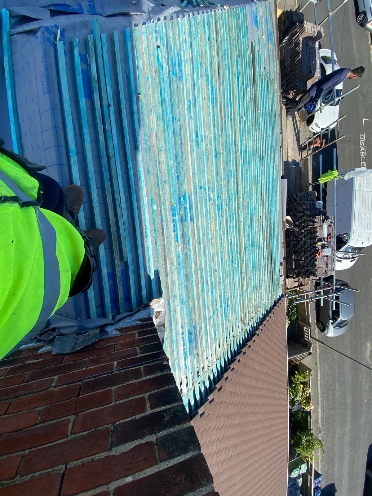 Repaired ridge line on a Bristol roof
